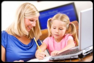 parenting-child-with-adhd-s17-child-shows-mom-what-she-can-do-on-computer-325x220