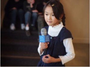 girl holding mic